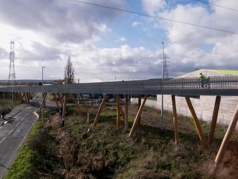 The new path ramps from the Eurostar bridge down to marsh level.